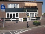 Voortuin.
              <br/>
              Bas van Roijen
